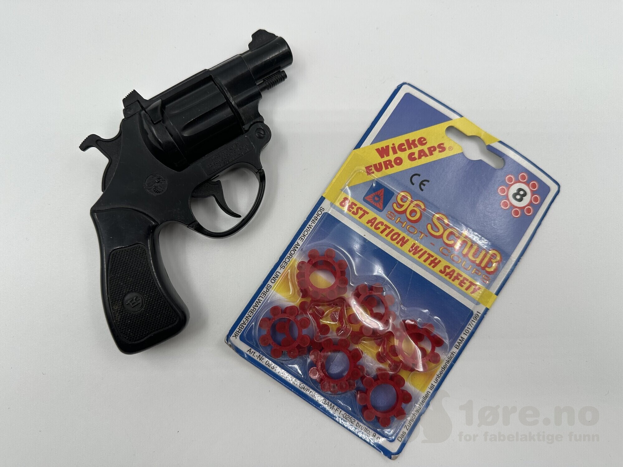 Lekepistol med kruttlapper inkludert